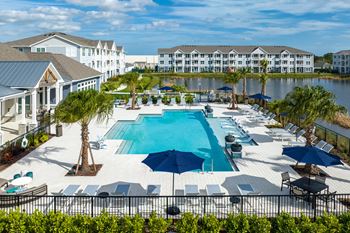 Resort style pool with tanning ledge & sundeck